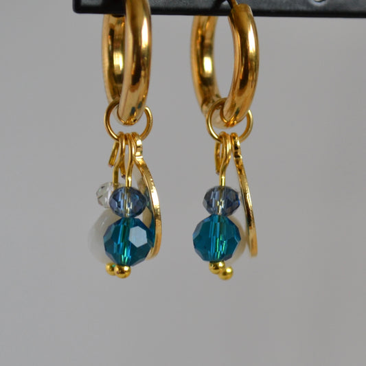 Oorbellen Celeste goudkleurig met kristalglas en parel hanger